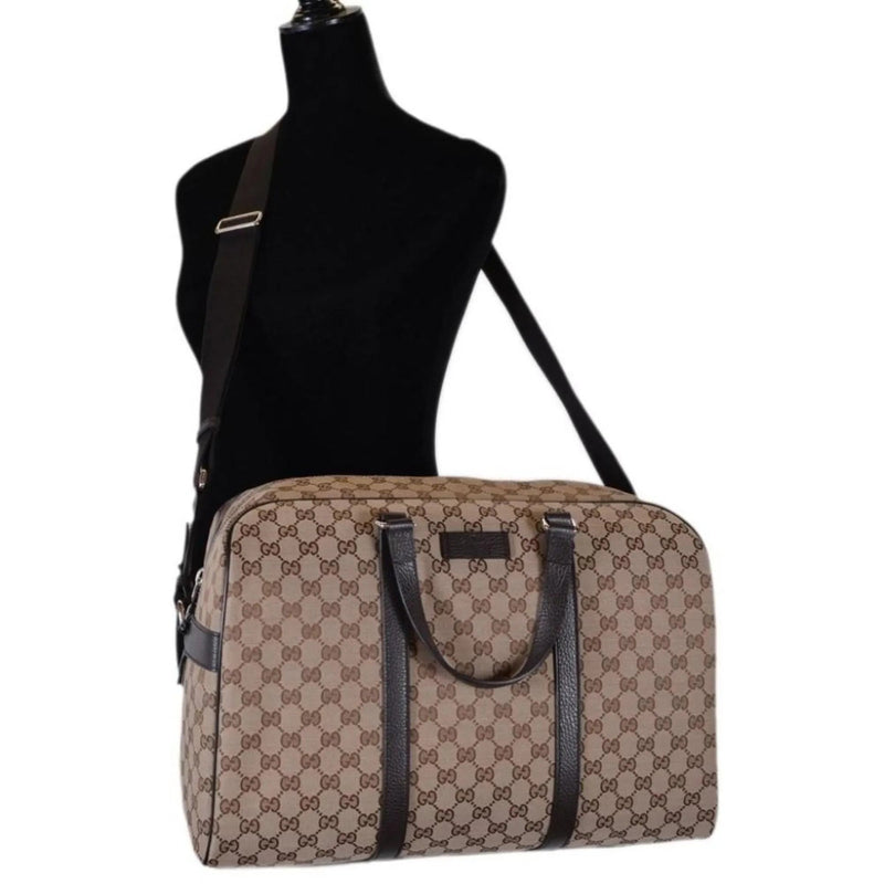 Gucci Large GG Logo Beige Canvas Brown Leather Strap Duffle Bag - Handbags - Clayton's Online Store