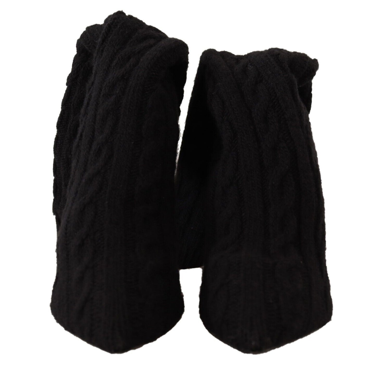 a pair of black mittens on a white background