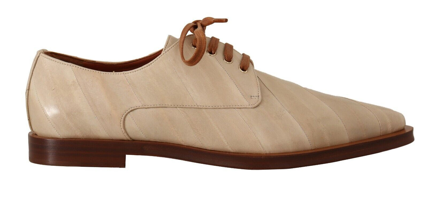 a white shoe with a brown rubber sole