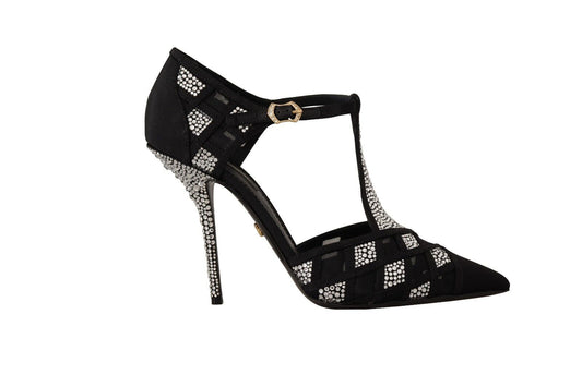 a black high heeled shoe with a diamond - embellishment